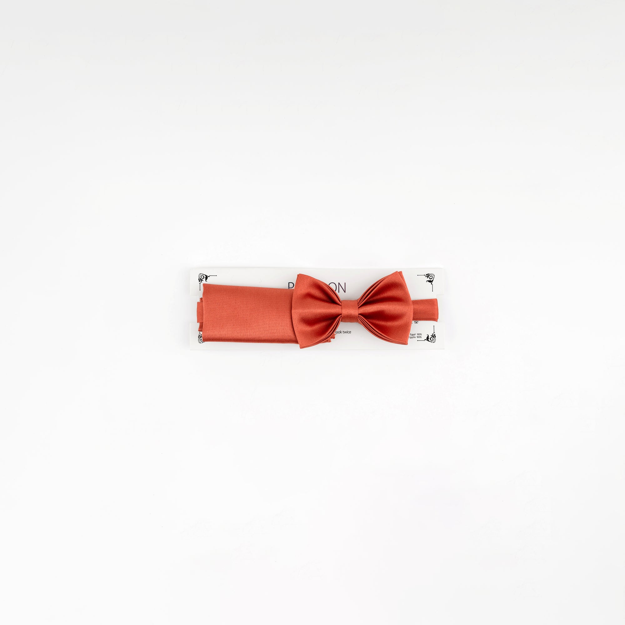 Orange bow tie on a white background