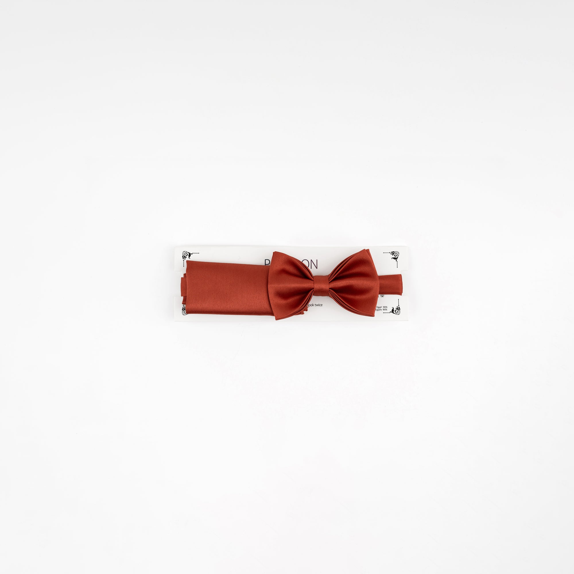 Red bow tie on a white background