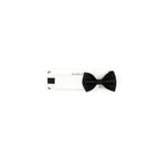 Black bow tie on a white background with 'DADILLO' branding.