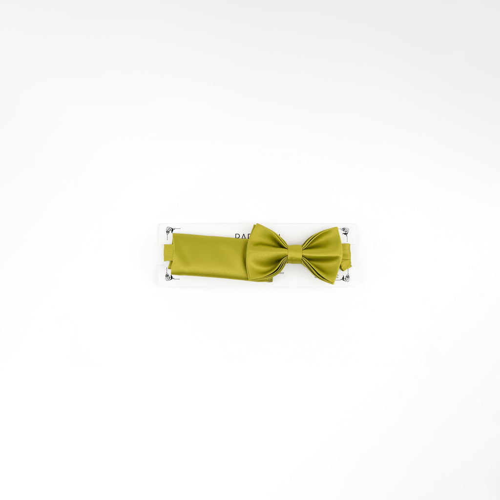 Green bow tie on a white background