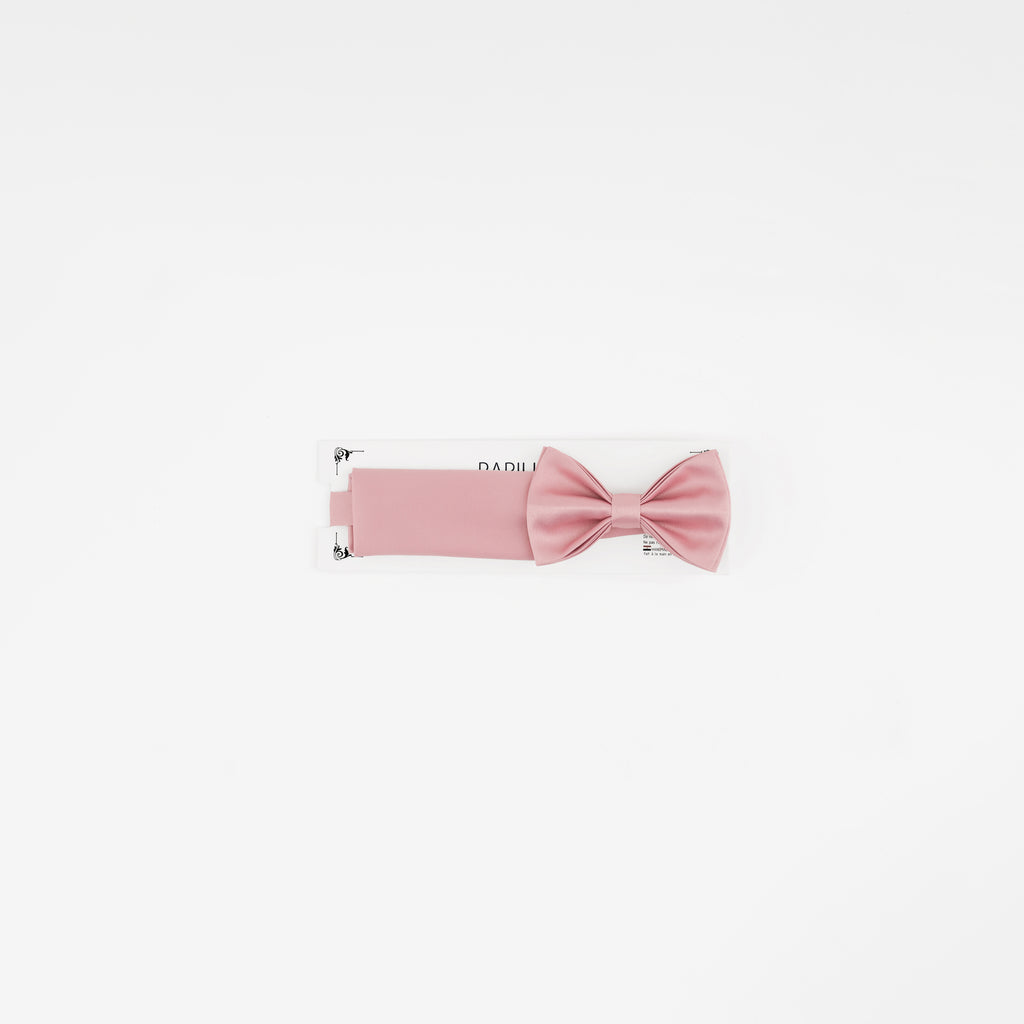 Pink bow tie on a white background